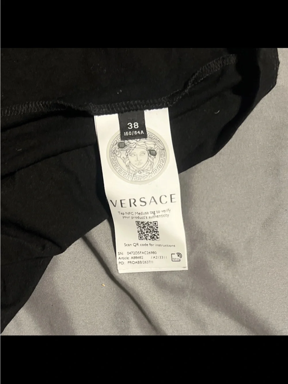 Versace Black Tee with White Medusa Crest and Lilac Script